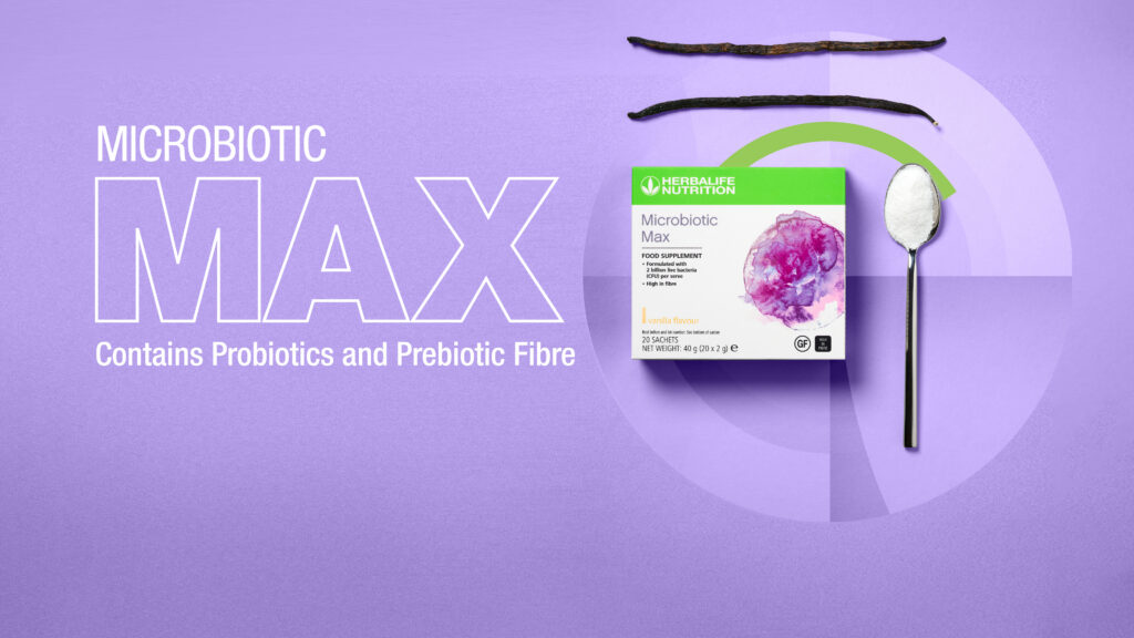 Herbalife Microbiotic Max vanilla flavour box displaying probiotic and prebiotic fibre benefits next to a spoon of supplement powder and vanilla pods on a purple background.
